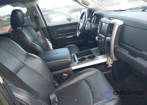 2015 Ram 1500 Laramie из США, поврежденный, VIN 1C6RR7NT7FS714057